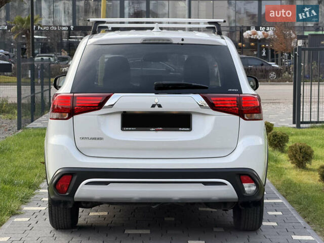 Білий Міцубісі Аутлендер, об'ємом двигуна 2 л та пробігом 52 тис. км за 21500 $, фото 16 на Automoto.ua