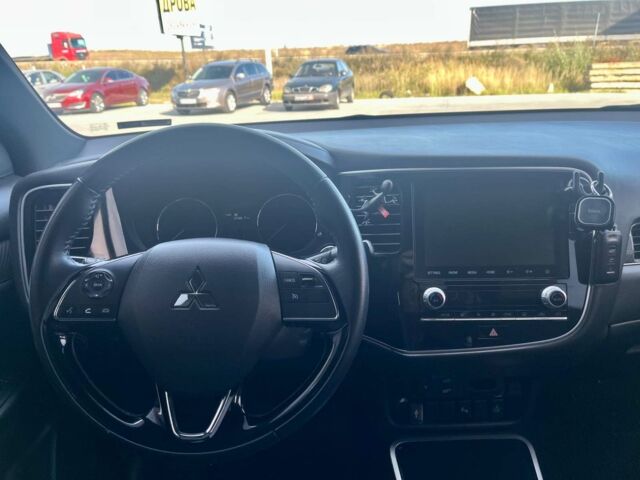 Белый Мицубиси Аутлендер, объемом двигателя 2.4 л и пробегом 120 тыс. км за 18990 $, фото 24 на Automoto.ua