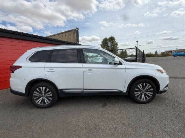 Белый Мицубиси Аутлендер, объемом двигателя 2.4 л и пробегом 65 тыс. км за 9500 $, фото 1 на Automoto.ua