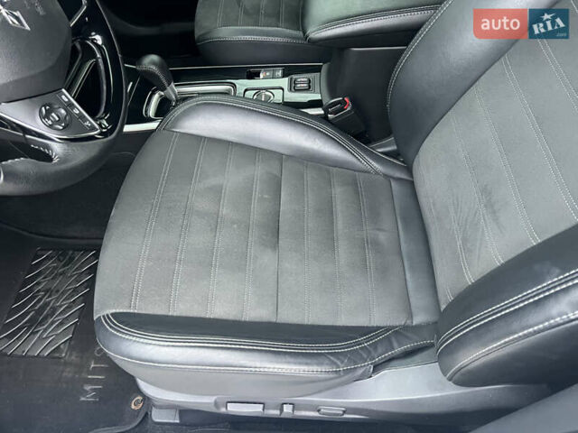 Белый Мицубиси Аутлендер, объемом двигателя 2.36 л и пробегом 59 тыс. км за 25000 $, фото 26 на Automoto.ua