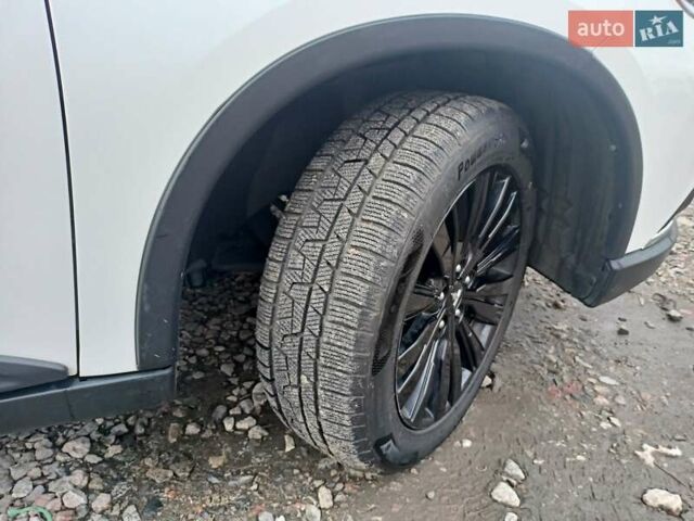 Білий Міцубісі Аутлендер, об'ємом двигуна 2.36 л та пробігом 170 тис. км за 18200 $, фото 6 на Automoto.ua