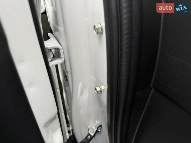 Білий Міцубісі Аутлендер, об'ємом двигуна 2 л та пробігом 63 тис. км за 20800 $, фото 41 на Automoto.ua