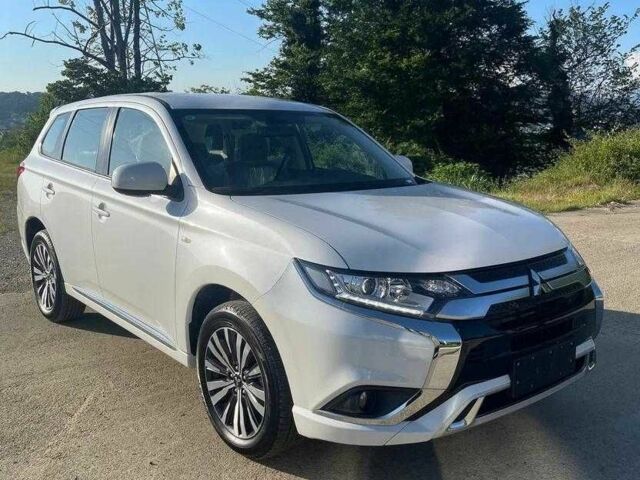 Белый Мицубиси Аутлендер, объемом двигателя 2 л и пробегом 77 тыс. км за 18200 $, фото 1 на Automoto.ua