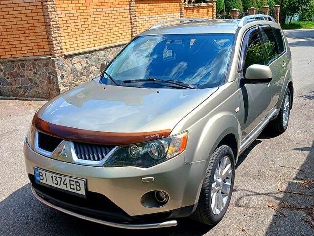 Бежевый Мицубиси Аутлендер, объемом двигателя 2.4 л и пробегом 204 тыс. км за 8500 $, фото 2 на Automoto.ua