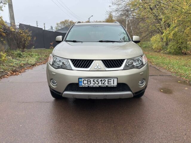 Бежевий Міцубісі Аутлендер, об'ємом двигуна 2.4 л та пробігом 220 тис. км за 8300 $, фото 3 на Automoto.ua