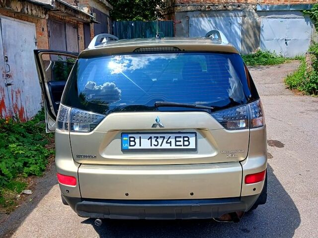 Бежевый Мицубиси Аутлендер, объемом двигателя 2.4 л и пробегом 204 тыс. км за 8500 $, фото 5 на Automoto.ua