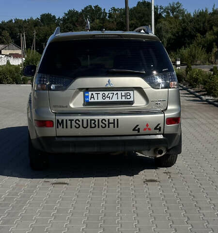 Бежевый Мицубиси Аутлендер, объемом двигателя 2.4 л и пробегом 290 тыс. км за 8500 $, фото 4 на Automoto.ua