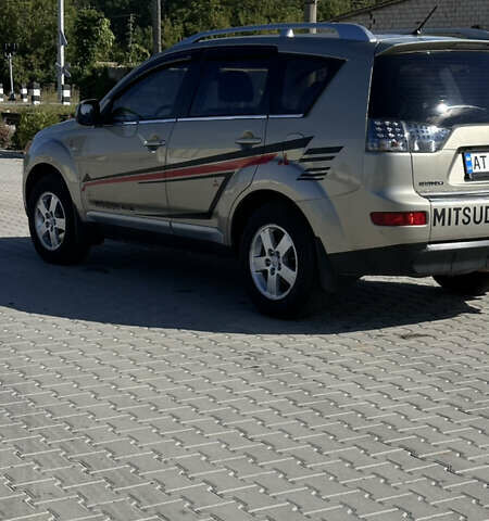 Бежевый Мицубиси Аутлендер, объемом двигателя 2.4 л и пробегом 290 тыс. км за 8500 $, фото 3 на Automoto.ua