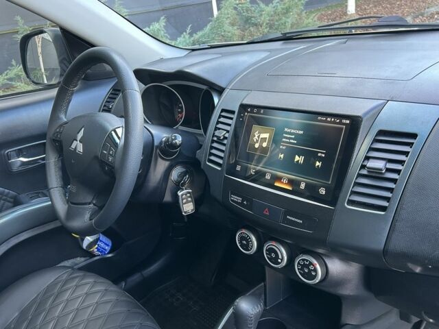 Бежевый Мицубиси Аутлендер, объемом двигателя 2.4 л и пробегом 226 тыс. км за 8999 $, фото 20 на Automoto.ua