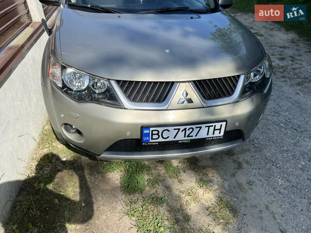 Бежевий Міцубісі Аутлендер, об'ємом двигуна 2.4 л та пробігом 252 тис. км за 8500 $, фото 9 на Automoto.ua