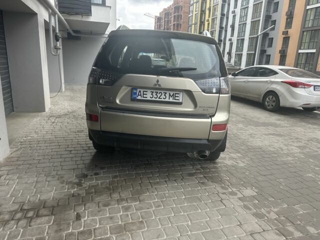 Бежевый Мицубиси Аутлендер, объемом двигателя 2.4 л и пробегом 290 тыс. км за 6950 $, фото 4 на Automoto.ua