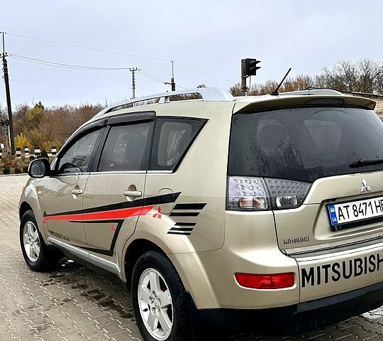 Бежевий Міцубісі Аутлендер, об'ємом двигуна 2.4 л та пробігом 270 тис. км за 8500 $, фото 4 на Automoto.ua