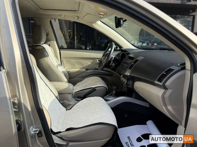 Бежевий Міцубісі Аутлендер, об'ємом двигуна 2.4 л та пробігом 195 тис. км за 8500 $, фото 19 на Automoto.ua