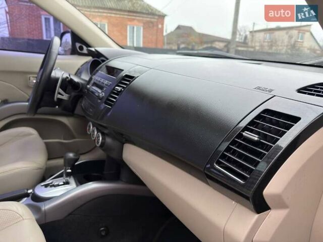 Бежевый Мицубиси Аутлендер, объемом двигателя 3 л и пробегом 178 тыс. км за 9450 $, фото 52 на Automoto.ua