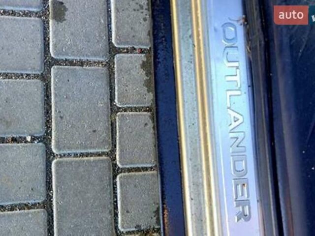 Бежевий Міцубісі Аутлендер, об'ємом двигуна 2.36 л та пробігом 220 тис. км за 9500 $, фото 7 на Automoto.ua