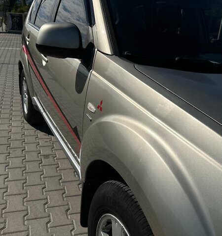 Бежевый Мицубиси Аутлендер, объемом двигателя 2.4 л и пробегом 290 тыс. км за 8500 $, фото 7 на Automoto.ua