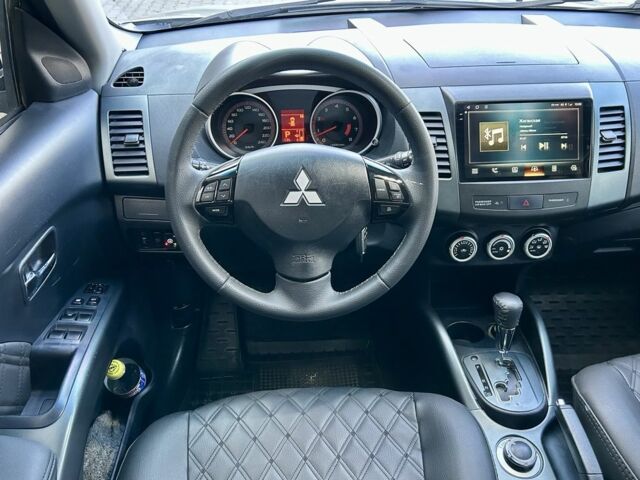 Бежевый Мицубиси Аутлендер, объемом двигателя 2.4 л и пробегом 226 тыс. км за 8999 $, фото 13 на Automoto.ua