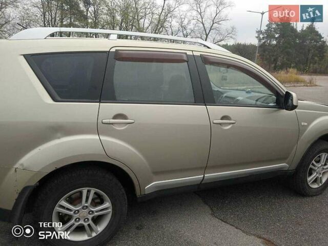 Бежевий Міцубісі Аутлендер, об'ємом двигуна 2.4 л та пробігом 290 тис. км за 6800 $, фото 2 на Automoto.ua
