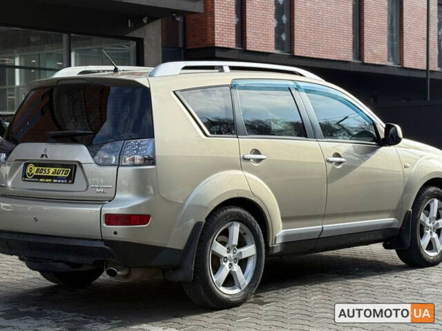 Бежевий Міцубісі Аутлендер, об'ємом двигуна 2.4 л та пробігом 195 тис. км за 8500 $, фото 5 на Automoto.ua