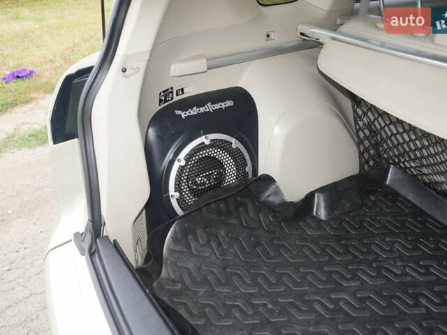 Бежевий Міцубісі Аутлендер, об'ємом двигуна 2.36 л та пробігом 207 тис. км за 10800 $, фото 50 на Automoto.ua