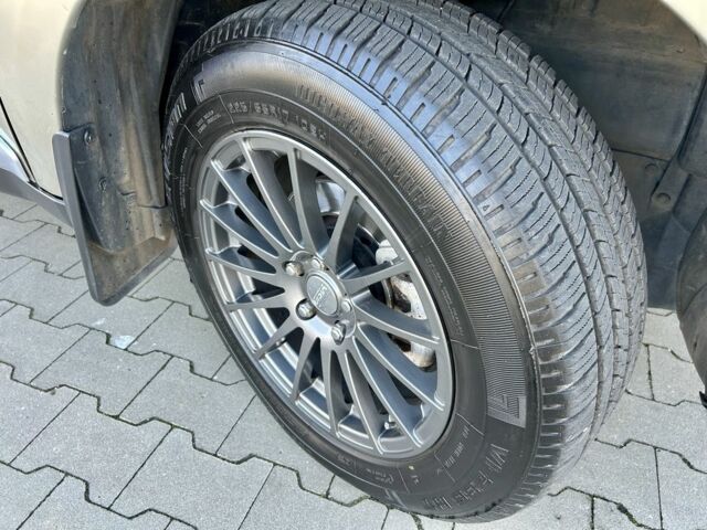 Бежевый Мицубиси Аутлендер, объемом двигателя 2.4 л и пробегом 226 тыс. км за 8999 $, фото 23 на Automoto.ua