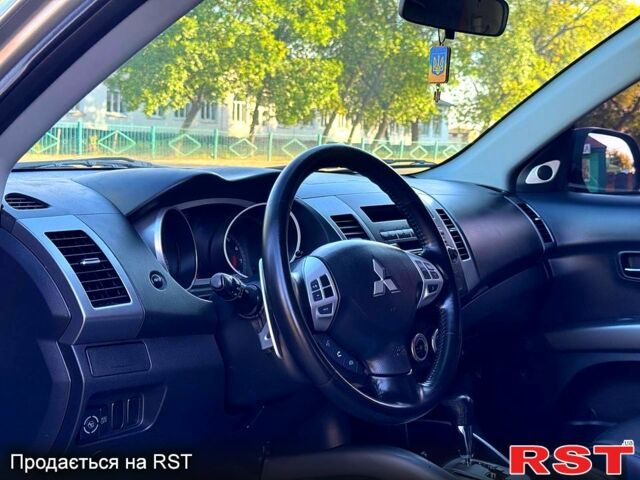 Бежевий Міцубісі Аутлендер, об'ємом двигуна 2.4 л та пробігом 180 тис. км за 8820 $, фото 4 на Automoto.ua