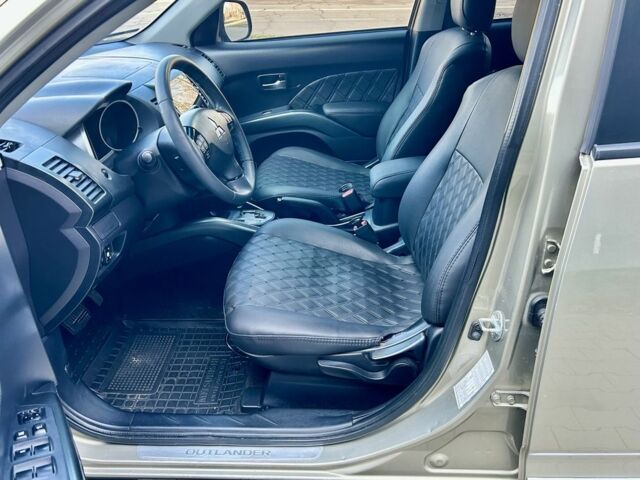 Бежевый Мицубиси Аутлендер, объемом двигателя 2.4 л и пробегом 226 тыс. км за 8999 $, фото 12 на Automoto.ua