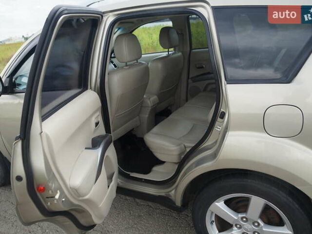 Бежевий Міцубісі Аутлендер, об'ємом двигуна 2.36 л та пробігом 207 тис. км за 10800 $, фото 35 на Automoto.ua