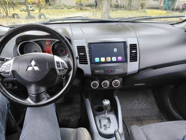 Бежевый Мицубиси Аутлендер, объемом двигателя 2.4 л и пробегом 301 тыс. км за 6199 $, фото 4 на Automoto.ua