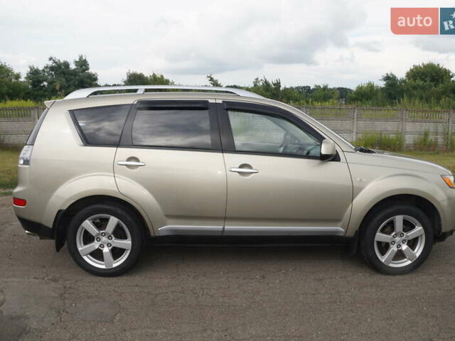Бежевий Міцубісі Аутлендер, об'ємом двигуна 2.36 л та пробігом 207 тис. км за 10800 $, фото 28 на Automoto.ua