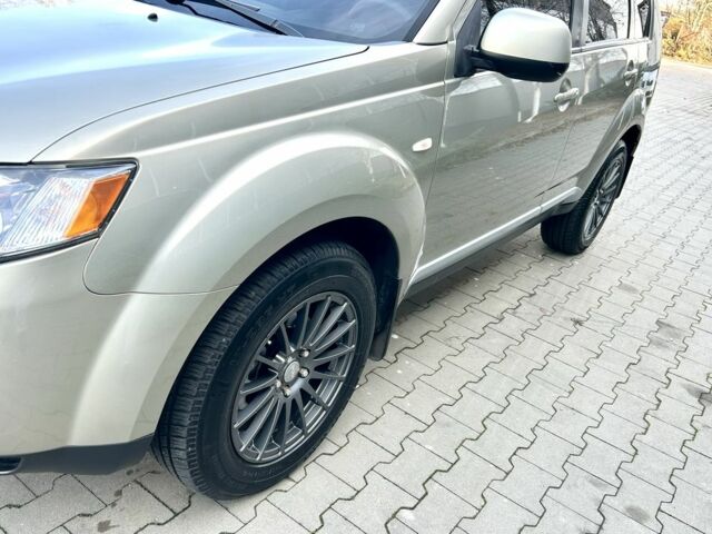 Бежевый Мицубиси Аутлендер, объемом двигателя 2.4 л и пробегом 226 тыс. км за 8999 $, фото 10 на Automoto.ua