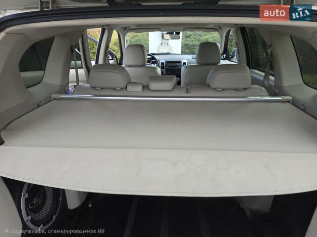 Бежевый Мицубиси Аутлендер, объемом двигателя 2.36 л и пробегом 159 тыс. км за 9683 $, фото 4 на Automoto.ua
