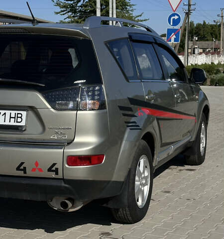 Бежевый Мицубиси Аутлендер, объемом двигателя 2.4 л и пробегом 290 тыс. км за 8500 $, фото 5 на Automoto.ua