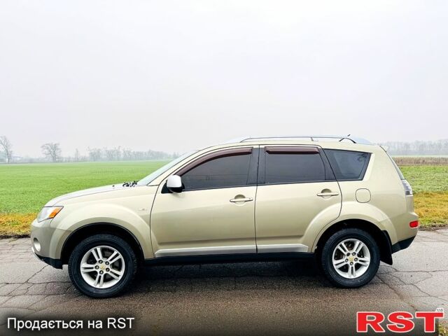 Бежевый Мицубиси Аутлендер, объемом двигателя 2.4 л и пробегом 107 тыс. км за 9900 $, фото 3 на Automoto.ua