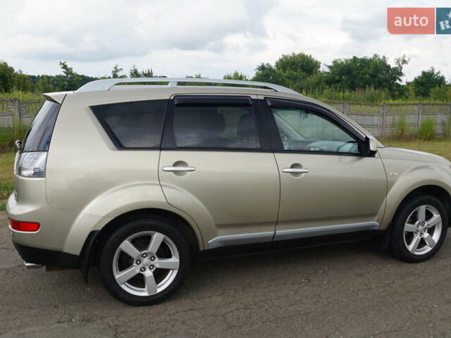 Бежевий Міцубісі Аутлендер, об'ємом двигуна 2.36 л та пробігом 207 тис. км за 10800 $, фото 19 на Automoto.ua