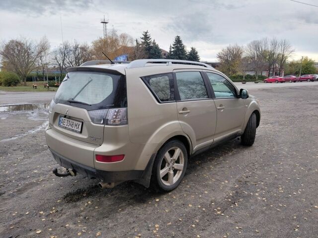 Бежевый Мицубиси Аутлендер, объемом двигателя 2.4 л и пробегом 301 тыс. км за 6199 $, фото 2 на Automoto.ua