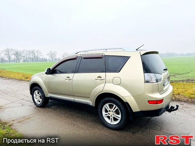 Бежевый Мицубиси Аутлендер, объемом двигателя 2.4 л и пробегом 107 тыс. км за 9900 $, фото 5 на Automoto.ua