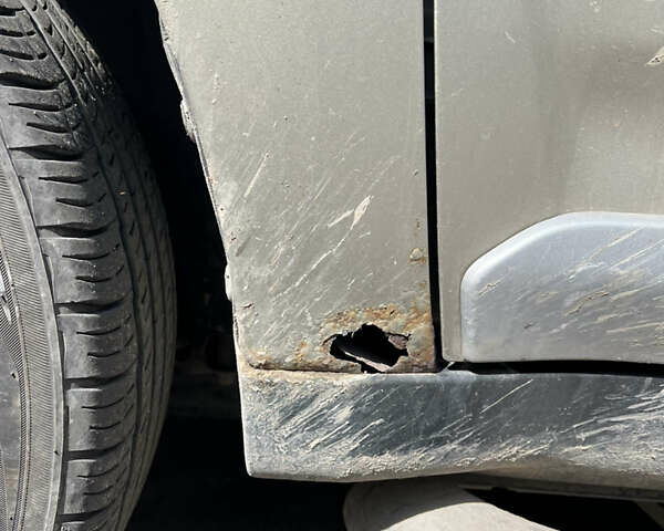 Бежевий Міцубісі Аутлендер, об'ємом двигуна 2.4 л та пробігом 252 тис. км за 8500 $, фото 5 на Automoto.ua
