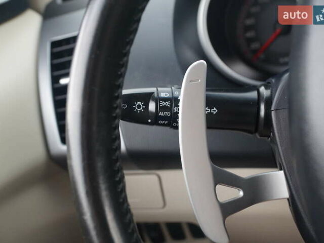 Бежевий Міцубісі Аутлендер, об'ємом двигуна 2.36 л та пробігом 207 тис. км за 10800 $, фото 68 на Automoto.ua