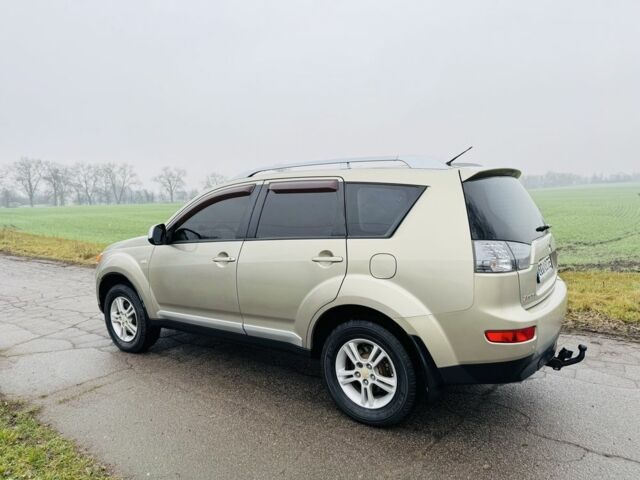 Бежевый Мицубиси Аутлендер, объемом двигателя 2.4 л и пробегом 107 тыс. км за 9900 $, фото 5 на Automoto.ua