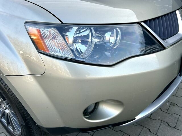 Бежевый Мицубиси Аутлендер, объемом двигателя 2.4 л и пробегом 226 тыс. км за 8999 $, фото 7 на Automoto.ua