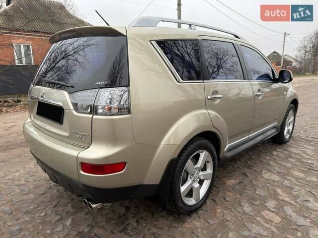 Бежевый Мицубиси Аутлендер, объемом двигателя 3 л и пробегом 178 тыс. км за 9450 $, фото 22 на Automoto.ua
