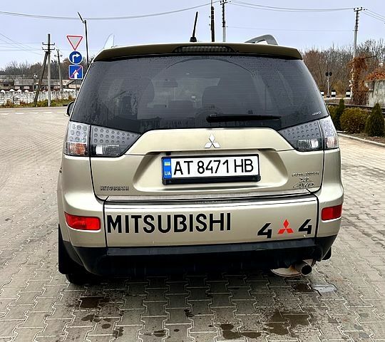 Бежевий Міцубісі Аутлендер, об'ємом двигуна 2.4 л та пробігом 270 тис. км за 8500 $, фото 5 на Automoto.ua