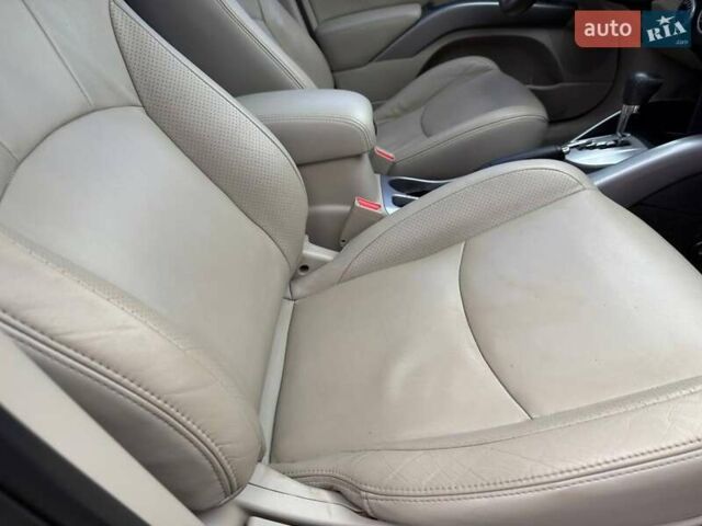 Бежевый Мицубиси Аутлендер, объемом двигателя 3 л и пробегом 178 тыс. км за 9450 $, фото 49 на Automoto.ua