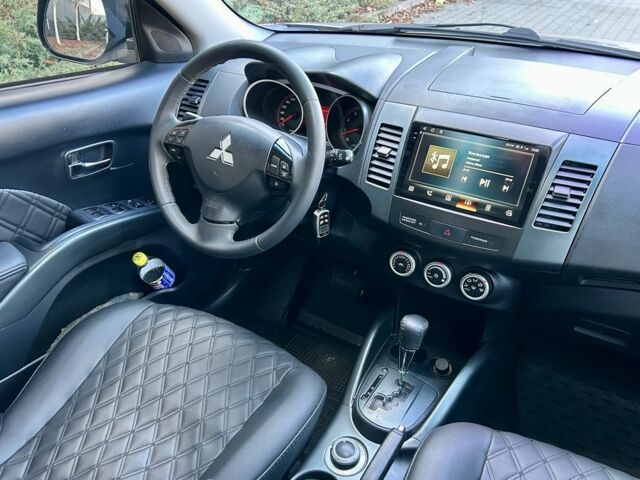 Бежевый Мицубиси Аутлендер, объемом двигателя 2.4 л и пробегом 226 тыс. км за 8999 $, фото 15 на Automoto.ua