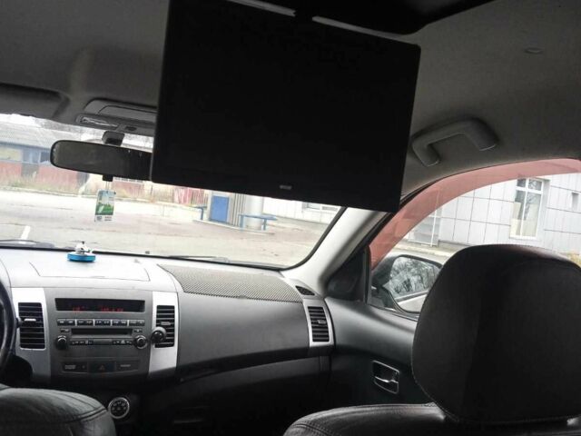 Бежевий Міцубісі Аутлендер, об'ємом двигуна 2.4 л та пробігом 290 тис. км за 6800 $, фото 7 на Automoto.ua