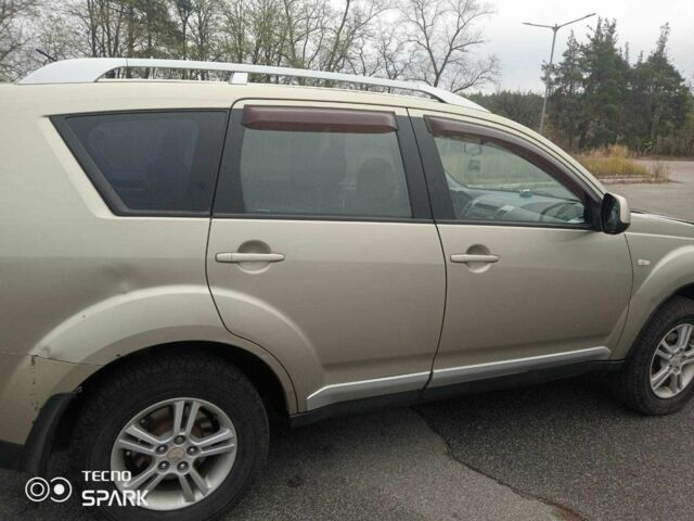Бежевий Міцубісі Аутлендер, об'ємом двигуна 2.4 л та пробігом 290 тис. км за 6800 $, фото 3 на Automoto.ua
