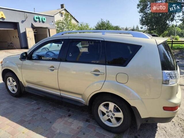 Бежевый Мицубиси Аутлендер, объемом двигателя 2.36 л и пробегом 281 тыс. км за 8500 $, фото 4 на Automoto.ua