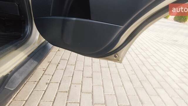 Бежевый Мицубиси Аутлендер, объемом двигателя 2.36 л и пробегом 200 тыс. км за 8300 $, фото 43 на Automoto.ua