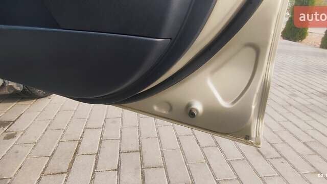 Бежевый Мицубиси Аутлендер, объемом двигателя 2.36 л и пробегом 200 тыс. км за 8300 $, фото 42 на Automoto.ua